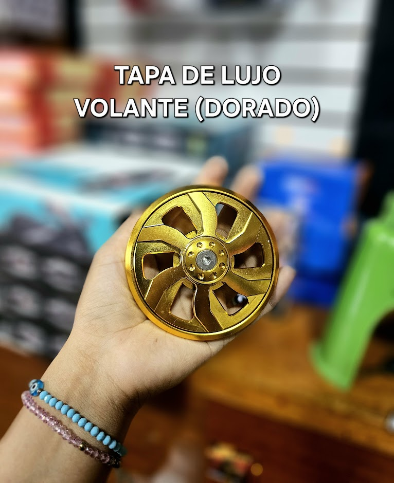 LUJO DE TAPA VOLANTE DORADO UND - COMPATIBLE CON CG/STD